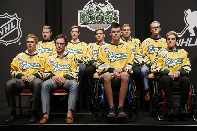 Members of the Humboldt Broncos hockey team attend a news conference Tuesday, June 19, 2018, in Las Vegas. The Saskatchewan junior hockey team's bus was in a collision with a semi-trailer on a rural highway in April resulting in multiple fatalities and injuries. (AP Photo/John Locher)