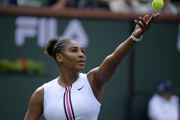 Serena Williams serves to Garbine Muguruza, of Spain, at the BNP Paribas Open tennis tournament Sunday, March 10, 2019, in Indian Wells, Calif. (AP Photo/Mark J. Terrill)