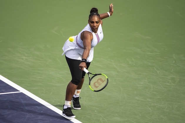 INDIAN WELLS, CALIFORNIA - MARCH 10: Serena Williams of the United States hits a backhand against Garbine Muguruza of Spain in the second round of the BNP Paribas Masters on March 10, 2019 at the Indian Wells Tennis Garden in Indian Wells, California. (Photo by TPN/Getty Images)
