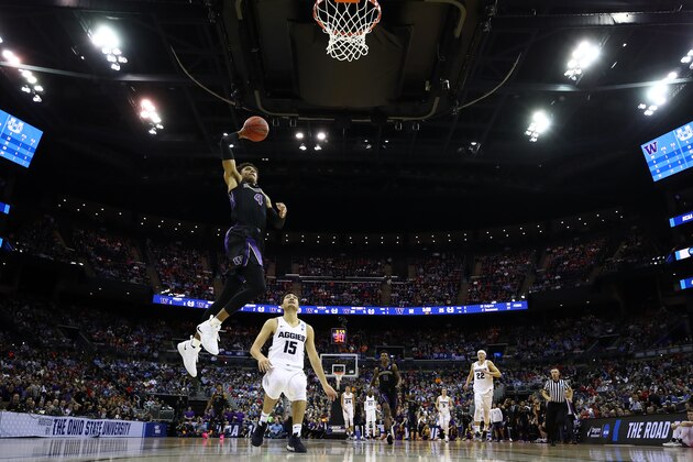 COLUMBUS, OHIO - MARCH 22:  Matisse Thybulle #4 of the Washington Huskies goes up to the basket against Abel Porter #15 of the Utah State Aggies during the first half of the game in the first round of the 2019 NCAA Men's Basketball Tournament at Nationwide Arena on March 22, 2019 in Columbus, Ohio. (Photo by Gregory Shamus/Getty Images)