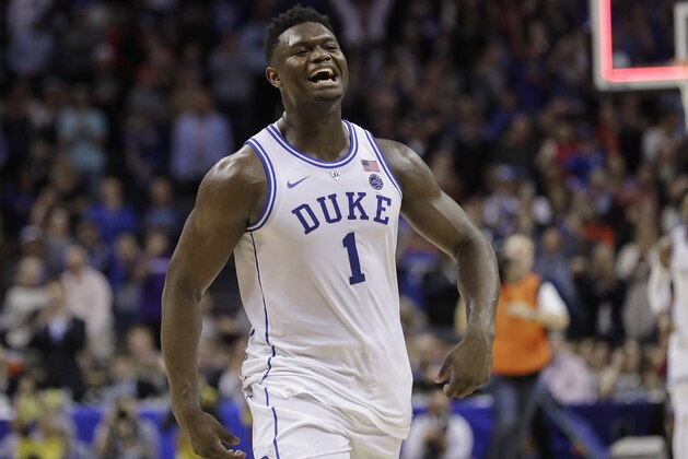 Duke's Zion Williamson (1) celebrates after Duke defeated Florida State in the NCAA college basketball championship game of the Atlantic Coast Conference tournament in Charlotte, N.C., Saturday, March 16, 2019. (AP Photo/Nell Redmond)