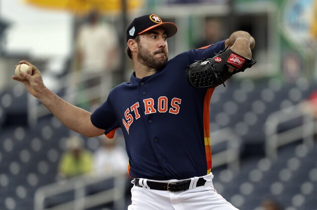 Houston Astros starting pitcher Justin Verlander throws during the first inning of an exhibition spring training baseball game against the New York Mets Monday, Feb. 25, 2019, in West Palm Beach, Fla. (AP Photo/Jeff Roberson)