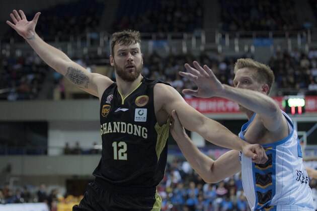 BEIJING, CHINA - NOVEMBER 02:  Donatas Motiejunas #12 of ShanDong Hi-Speed in action during the 2017/2018 CBA League match between Beijing Ducks and ShanDong Hi-Speed at Shougang Basketball Center Gymnasium on November 2, 2017 in Beijing, China.  (Photo by XIN LI/Getty Images)