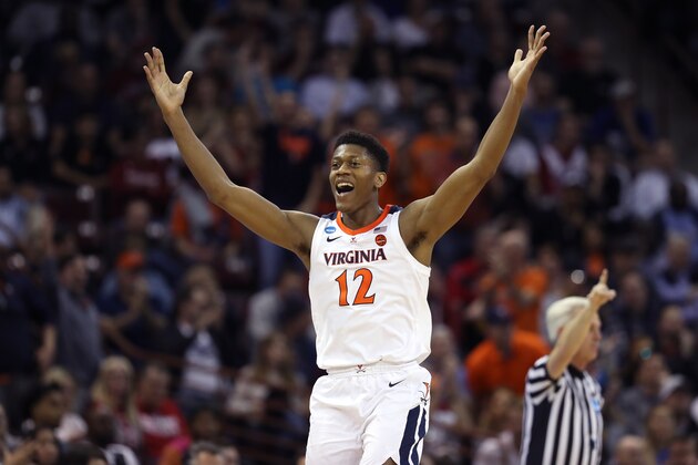 COLUMBIA, SOUTH CAROLINA - MARCH 22: De'Andre Hunter #12 of the Virginia Cavaliers celebrates after a play in the second half against the Gardner Webb Runnin Bulldogs during the first round of the 2019 NCAA Men's Basketball Tournament at Colonial Life Arena on March 22, 2019 in Columbia, South Carolina. (Photo by Streeter Lecka/Getty Images)