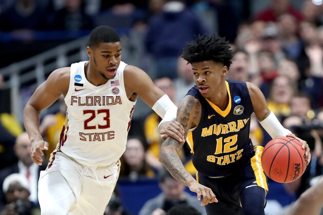HARTFORD, CONNECTICUT - MARCH 23:  Ja Morant #12 of the Murray State Racers is defended by M.J. Walker #23 of the Florida State Seminoles in the first half during the second round of the 2019 NCAA Men's Basketball Tournament at XL Center on March 23, 2019 in Hartford, Connecticut. (Photo by Rob Carr/Getty Images)