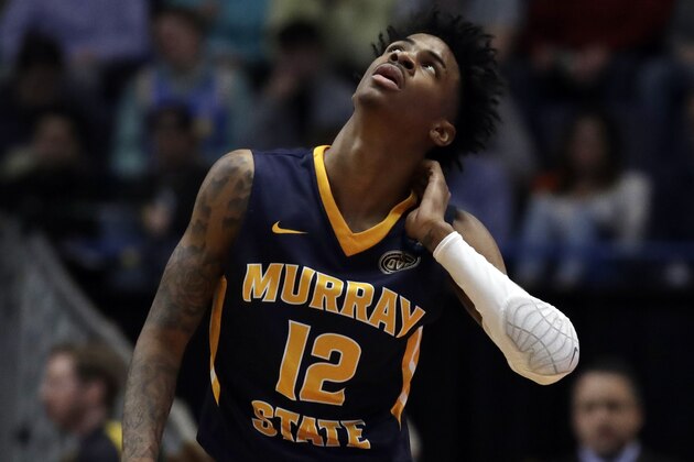 Murray State's Ja Morant (12) looks up at the scoreboard during the first half of a second round men's college basketball game against Florida State in the NCAA Tournament, Saturday, March 23, 2019, in Hartford, Conn. (AP Photo/Elise Amendola)