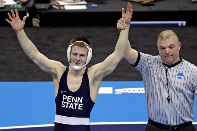 Penn State's Jason Nolf, left, celebrates his win over Nebraska's Tyler Berger in their 157-pound match in the finals of the NCAA wrestling championships Saturday, March 23, 2019, in Pittsburgh. (AP Photo/Gene J. Puskar)