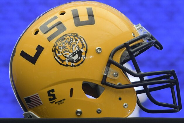 An LSU helmet is pictured at NCAA college football Southeastern Conference media days at the College Football Hall of Fame in Atlanta, Monday, July 16, 2018. (AP Photo/John Amis)