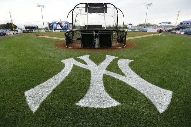 The New York Yankees logo is painted on the field before an exhibition baseball game between the Yankees and the Pittsburgh Pirates Thursday, Feb. 27, 2014, in Tampa, Fla. (AP Photo/Charlie Neibergall)