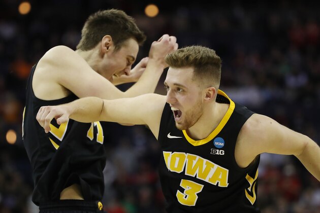 COLUMBUS, OHIO - MARCH 22: Jordan Bohannon #3 of the Iowa Hawkeyes celebrates with teammates after defeating the Cincinnati Bearcats 79-72 in the first round of the 2019 NCAA Men's Basketball Tournament at Nationwide Arena on March 22, 2019 in Columbus, Ohio. (Photo by Gregory Shamus/Getty Images)