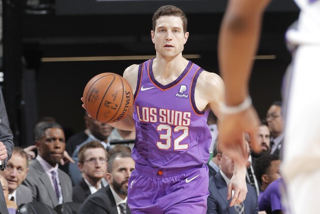 SACRAMENTO, CA - MARCH 23: Jimmer Fredette #32 of the Phoenix Suns moves the ball up court during the game against the Sacramento Kings on March 23, 2019 at Golden 1 Center in Sacramento, California. NOTE TO USER: User expressly acknowledges and agrees that, by downloading and or using this Photograph, user is consenting to the terms and conditions of the Getty Images License Agreement. Mandatory Copyright Notice: Copyright 2019 NBAE (Photo by Rocky Widner/NBAE via Getty Images)