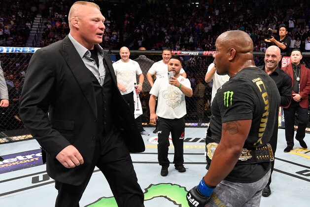 LAS VEGAS, NV - JULY 07:  Brock Lesnar confronts Daniel Cormier after his UFC heavyweight championship fight during the UFC 226 event inside T-Mobile Arena on July 7, 2018 in Las Vegas, Nevada.  (Photo by Josh Hedges/Zuffa LLC/Zuffa LLC via Getty Images)