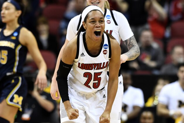 Louisville guard Asia Durr (25) celebrates following a basket where she was fouled on the shot during the first half of a second-round game in the NCAA women's college basketball tournament in Louisville, Ky., Sunday, March 24, 2019. (AP Photo/Timothy D. Easley)