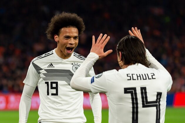 AMSTERDAM, NETERLANDS - MARCH 24: Leroy Sane of Germany celebrates after scoring his team's first goal with team mates during the 2020 UEFA European Championships group C qualifying match between Netherlands and Germany at Johan Cruijff ArenA on March 24, 2019 in Amsterdam, Netherlands. (Photo by TF-Images/Getty Images)
