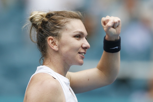 MIAMI GARDENS, FLORIDA - MARCH 24:  Simona Halep of Romania celebrates after defeating Polona Hercog of Slovenia on Day 7 of the Miami Open Presented by Itau at Hard Rock Stadium on March 24, 2019 in Miami Gardens, Florida. (Photo by Michael Reaves/Getty Images)