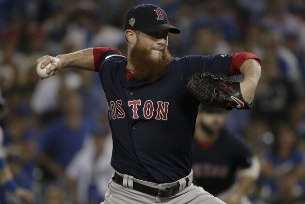 Boston Red Sox relief pitcher Craig Kimbrel throws against the Los Angeles Dodgers during the ninth inning in Game 3 of the World Series baseball game on Friday, Oct. 26, 2018, in Los Angeles. (AP Photo/Jae C. Hong)
