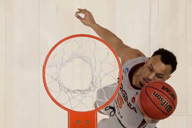 Virginia Tech guard Justin Robinson scores against Liberty during the first half of a second-round game in the NCAA men's college basketball tournament Sunday, March 24, 2019, in San Jose, Calif. (AP Photo/Ben Margot)