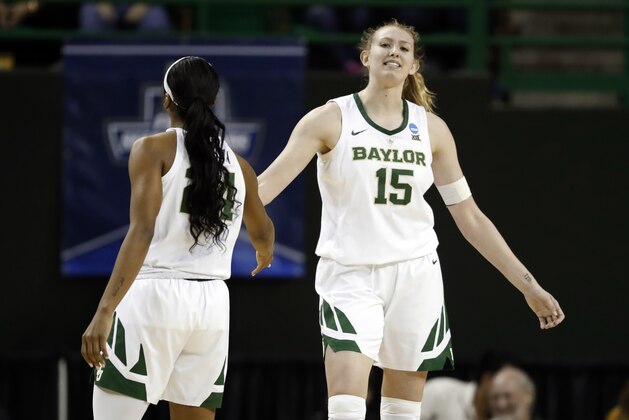Baylor guard Chloe Jackson (24) and forward Lauren Cox (15) celebrate in the first half a first-round game against Baylor in the NCAA women's college basketball tournament in Waco, Texas, Saturday March 23, 2019. (AP Photo/Tony Gutierrez)