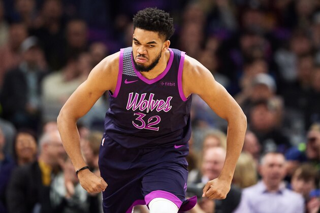 MINNEAPOLIS, MN - MARCH 19: Karl-Anthony Towns #32 of the Minnesota Timberwolves reacts after a play against the Golden State Warriors during the game on March 19, 2019 at the Target Center in Minneapolis, Minnesota. NOTE TO USER: User expressly acknowledges and agrees that, by downloading and or using this Photograph, user is consenting to the terms and conditions of the Getty Images License Agreement. (Photo by Hannah Foslien/Getty Images)