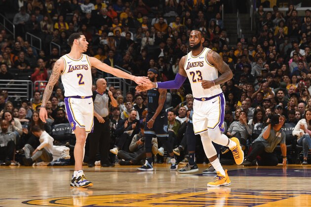 LOS ANGELES, CA - DECEMBER 23: Lonzo Ball #0 hi-fives LeBron James #23 of the Los Angeles Lakers on December 23, 2018 at STAPLES Center in Los Angeles, California. NOTE TO USER: User expressly acknowledges and agrees that, by downloading and/or using this Photograph, user is consenting to the terms and conditions of the Getty Images License Agreement. Mandatory Copyright Notice: Copyright 2018 NBAE (Photo by Andrew D. Bernstein/NBAE via Getty Images)