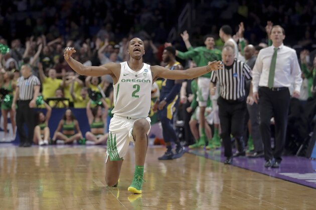 Oregon forward Louis King celebrates after scoring against UC Irvine during the second half of a second-round game in the NCAA men's college basketball tournament Sunday, March 24, 2019, in San Jose, Calif. (AP Photo/Jeff Chiu)