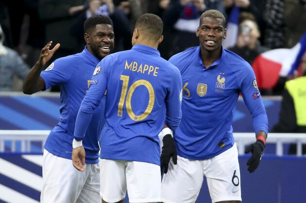 PARIS, FRANCE - MARCH 25: Samuel Umtiti of France celebrates his goal with Kylian Mbappe, Paul Pogba and teammates during the 2020 UEFA European Championships group H qualifying match between France and Iceland at Stade de France on March 25, 2019 in Saint-Denis near Paris, France. (Photo by Jean Catuffe/Getty Images)