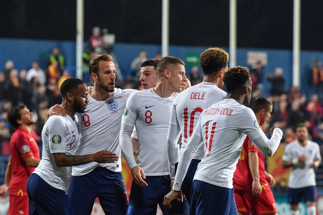 England's midfielder Ross Barkley (C) celebrates with teammates after scoring his second goal of the Euro 2020 football qualification match between Montenegro and England at Podgorica City Stadium on March 25, 2019 in Podgorica, Montenegro. (Photo by Andrej ISAKOVIC / AFP)        (Photo credit should read ANDREJ ISAKOVIC/AFP/Getty Images)