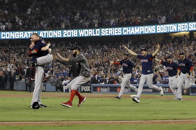 FILE - In this Oct. 28, 2018, file photo, the Boston Red Sox celebrate after Game 5 of baseball's World Series against the Los Angeles Dodgers in Los Angeles. The Red Sox won 5-1 to win the series 4 games to 1. (AP Photo/David J. Phillip)