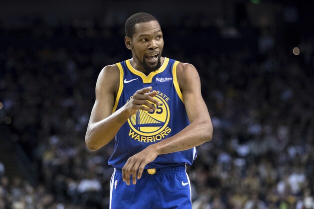 Golden State Warriors forward Kevin Durant reacts in the game against the Dallas Mavericks in the second half of an NBA basketball game Saturday, March 23, 2019 in Oakland, Calif. The Mavericks won 126-91. (AP Photo/John Hefti)