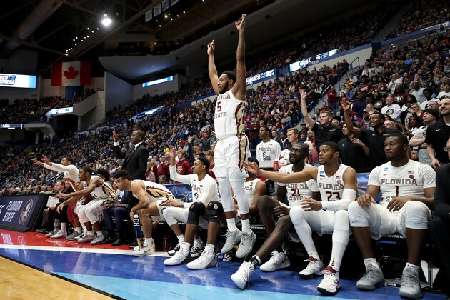 HARTFORD, CONNECTICUT - MARCH 23:  The Florida State Seminoles bench celebrates their teams lead against the Murray State Racers in the second half during the second round of the 2019 NCAA Men's Basketball Tournament at XL Center on March 23, 2019 in Hartford, Connecticut. (Photo by Rob Carr/Getty Images)