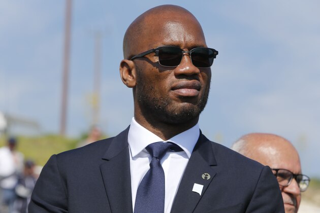 Former Ivorian international footballer Didier Drogba attends the Peace and Sport friendly football day in Pyla, a town that sits in the UN-patrolled buffer zone and spreads into Cypriot territory to the south, on March 19, 2019. - Turkish Cypriot leader Mustafa Akinci snubbed the football match aimed at fostering dialogue on the divided island, in a row over where the game was played. The match between Cypriot club Nea Salamina Ammochostou and Magusa Turk Gucu, from the breakaway north, kicked off in the mixed village of Pyla. (Photo by Matthieu CLAVEL / AFP)        (Photo credit should read MATTHIEU CLAVEL/AFP/Getty Images)
