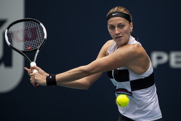 MIAMI GARDENS, FLORIDA - MARCH 25: Petra Kvitova of the Czech Republic hits a backhand against Caroline Garcia of France in the 4th Round of the women's singles at the Miami Open on March 25, 2019 in Miami Gardens, Florida. (Photo by TPN/Getty Images)