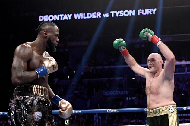 LOS ANGELES, CA - DECEMBER 01:  Tyson Fury baits Deontay Wilder in the second round, fighting to a draw during the WBC Heavyweight Championship at Staples Center on December 1, 2018 in Los Angeles, California.  (Photo by Harry How/Getty Images)