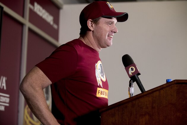 Washington Redskins head coach Jay Gruden smiles while speaking at a news conference at Redskins Park, Monday, Dec. 31, 2018, in Ashburn, Va. The Washington Redskins ended their season Sunday with a 24-0 loss to the Philadelphia Eagles. (AP Photo/Andrew Harnik)
