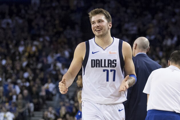Dallas Mavericks forward Luka Doncic reacts in the game against the Golden State Warriors in the second half of an NBA basketball game Saturday, March 23, 2019 in Oakland, Calif. The Mavericks won 126-91. (AP Photo/John Hefti)