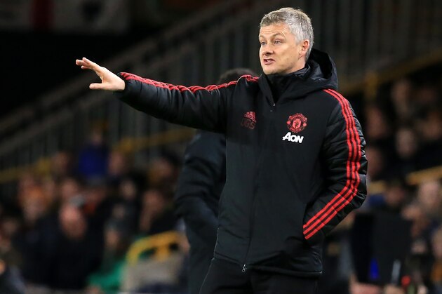 Manchester United's Norwegian head coach Ole Gunnar Solskjaer gestures on the touchline during the FA Cup quarter-final football match between Wolverhampton Wanderers and Manchester United at the Molineux stadium in Wolverhampton, central England on March 16, 2019. (Photo by Lindsey PARNABY / AFP) / RESTRICTED TO EDITORIAL USE. No use with unauthorized audio, video, data, fixture lists, club/league logos or 'live' services. Online in-match use limited to 120 images. An additional 40 images may be used in extra time. No video emulation. Social media in-match use limited to 120 images. An additional 40 images may be used in extra time. No use in betting publications, games or single club/league/player publications. /         (Photo credit should read LINDSEY PARNABY/AFP/Getty Images)