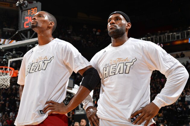 SAN ANTONIO, TX - JUNE 5: LeBron James #6 and Chris Bosh #1 of the Miami Heat looks on against the San Antonio Spurs during Game One of the 2014 NBA Finals on June 5, 2014 at AT&T Center in San Antonio, Texas. NOTE TO USER: User expressly acknowledges and agrees that, by downloading and or using this photograph, User is consenting to the terms and conditions of the Getty Images License Agreement. Mandatory Copyright Notice: Copyright 2014 NBAE (Photo by Jesse D. Garrabrant/NBAE via Getty Images)