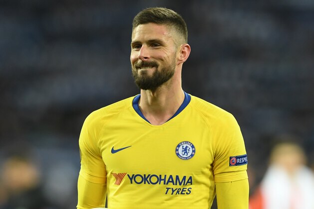 KIEV, UKRAINE - MARCH 14:  Hat trick scorer Olivier Giroud of Chelsea celebrates with the match ball after the UEFA Europa League Round of 16 Second Leg match between Dynamo Kyiv and Chelsea at NSC Olimpiyskiy Stadium on March 14, 2019 in Kiev, Ukraine. (Photo by Mike Hewitt/Getty Images)