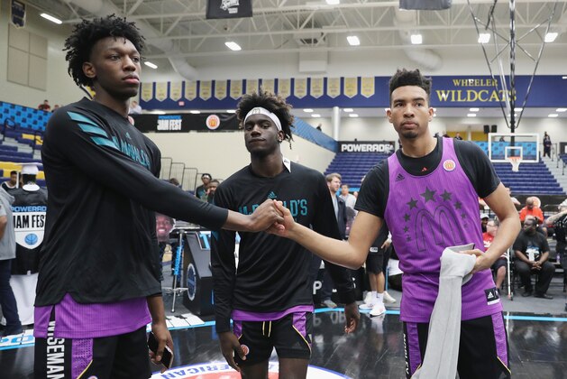 MARIETTA, GA - MARCH 25:  James Wiseman reacts with Isaiah Mobley before the 2019 Powerade Jam Fest on March 25, 2019 in Marietta, Georgia.  (Photo by Patrick Smith/Getty Images for Powerade)