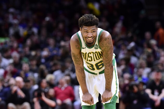 CLEVELAND, OHIO - MARCH 26: Marcus Smart #36 of the Boston Celtics jokes with teammates during the second half against the Cleveland Cavaliers at Quicken Loans Arena on March 26, 2019 in Cleveland, Ohio. The Celtics defeated the Cavaliers 116-106. NOTE TO USER: User expressly acknowledges and agrees that, by downloading and or using this photograph, User is consenting to the terms and conditions of the Getty Images License Agreement. (Photo by Jason Miller/Getty Images)