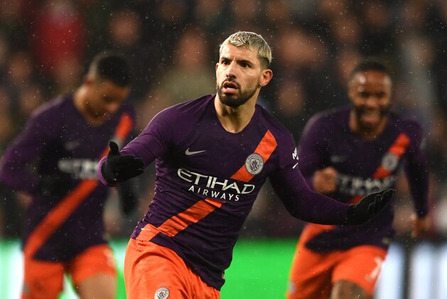 SWANSEA, WALES - MARCH 16: Sergio Aguero of Manchester City celebrates his team's second goal which rebounds off Kristoffer Nordfeldt of Swansea City for an own goal during the FA Cup Quarter Final match between Swansea City and Manchester City at Liberty Stadium on March 16, 2019 in Swansea, United Kingdom. (Photo by Harry Trump/Getty Images)