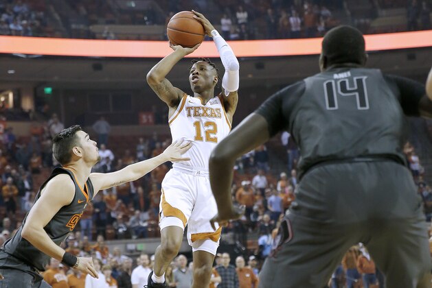 AUSTIN, TEXAS - FEBRUARY 16: Kerwin Roach II #12 of the Texas Longhorns shoots over Thomas Dziagwa #4 of the Oklahoma State Cowboys at The Frank Erwin Center on February 16, 2019 in Austin, Texas. (Photo by Chris Covatta/Getty Images)