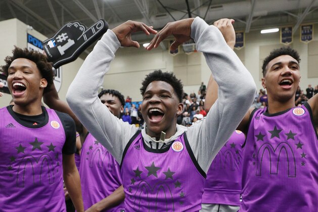 MARIETTA, GA - MARCH 25:  (L-R) Wendell Moore Jr., Anthony Edwards and Trayce Jackson-Davis react during the 2019 Powerade Jam Fest on March 25, 2019 in Marietta, Georgia.  (Photo by Patrick Smith/Getty Images for Powerade)
