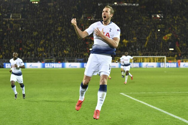 Tottenham forward Harry Kane celebrates after scoring the opening goal during the Champions League round of 16, 2nd leg, soccer match between Borussia Dortmund and Tottenham Hotspur at the BVB stadium in Dortmund, Germany, Tuesday, March 5, 2019. (Bernd Thissen/dpa via AP)