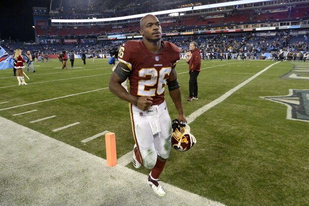 Washington Redskins running back Adrian Peterson (26) leaves the field after an NFL football game against the Tennessee Titans Saturday, Dec. 22, 2018, in Nashville, Tenn. The Titans won 25-16. (AP Photo/Mark Zaleski)