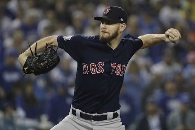 Boston Red Sox pitcher Chris Sale throws during the ninth inning in Game 5 of the World Series baseball game against the Los Angeles Dodgers on Sunday, Oct. 28, 2018, in Los Angeles. (AP Photo/David J. Phillip)