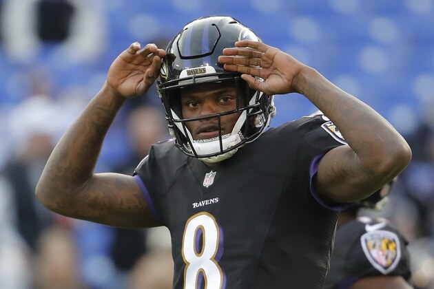 Baltimore Ravens quarterback Lamar Jackson looks to fans before an NFL football game against the Cleveland Browns, Sunday, Dec. 30, 2018, in Baltimore. (AP Photo/Carolyn Kaster)
