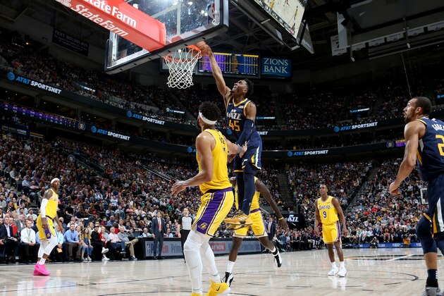 SALT LAKE CITY, UT - MARCH 27: Donovan Mitchell #45 of the Utah Jazz dunks the ball during the game against the Los Angeles Lakers on March 27, 2019 at vivint.SmartHome Arena in Salt Lake City, Utah. NOTE TO USER: User expressly acknowledges and agrees that, by downloading and or using this Photograph, User is consenting to the terms and conditions of the Getty Images License Agreement. Mandatory Copyright Notice: Copyright 2019 NBAE (Photo by Melissa Majchrzak/NBAE via Getty Images)