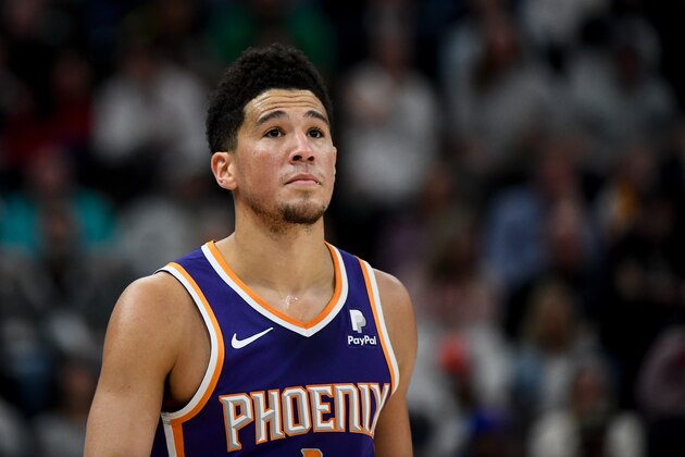 SALT LAKE CITY, UT - MARCH 25:  Devin Booker #1 of the Phoenix Suns looks on during a game against the Utah Jazz at Vivint Smart Home Arena on March 25, 2019 in Salt Lake City, Utah. NOTE TO USER: User expressly acknowledges and agrees that, by downloading and or using this photograph, User is consenting to the terms and conditions of the Getty Images License Agreement.  (Photo by Alex Goodlett/Getty Images)