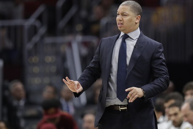 Cleveland Cavaliers coach Tyronn Lue calls a play during the second half of Game 4 of basketball's NBA Finals against the Golden State Warriors, Friday, June 8, 2018, in Cleveland. (AP Photo/Tony Dejak)